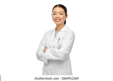 medicine, profession and healthcare concept - happy smiling asian female doctor or scientist with crossed arms in white coat