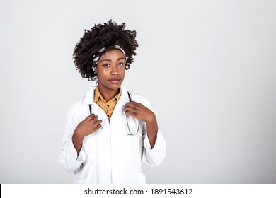 Medicine, Profession And Healthcare Concept - Happy Smiling African American Female Doctor In White Coat With Stethoscope Over Background