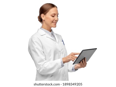 medicine, profession and healthcare concept - happy smiling female doctor or scientist in white coat with tablet pc computer