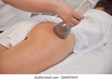 medicine salon, lifting body, beauty care. Vacuum body massage can help reduce fat in problem areas, slimming of problem areas, special body care equipment for slimming, lpg massage procedure - Shutterstock ID 2244376927