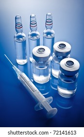 Medicine vials and syringe