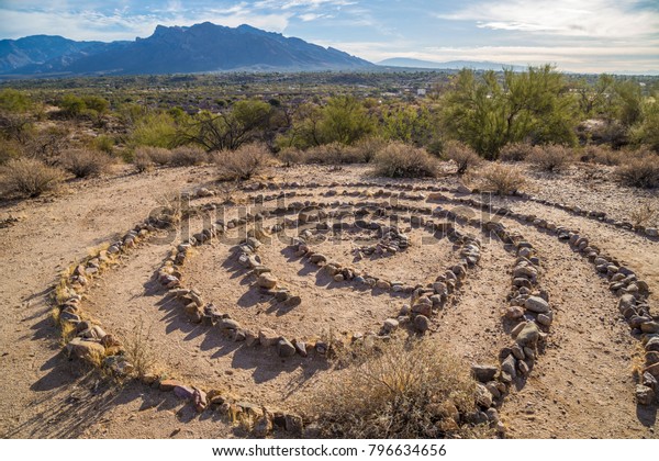Medicine wheel southwest native american\
indian spiritual zen buddha sedona arizona tucson journey\
meditation prayer religion desert mountains blue sky\
spiral