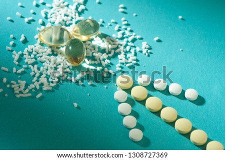 Medicines arranged in an arrow shape
