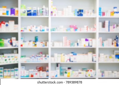 Medicines arranged in shelves at pharmacy out of the focus
Pharmacy background photo