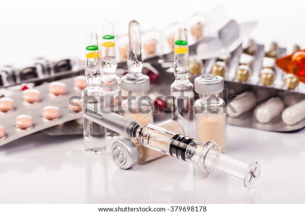 medicines and drugs isolated\
on white