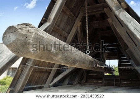 A medieval battering ram is a siege engine used in the past. Les Baux de Provence, France 