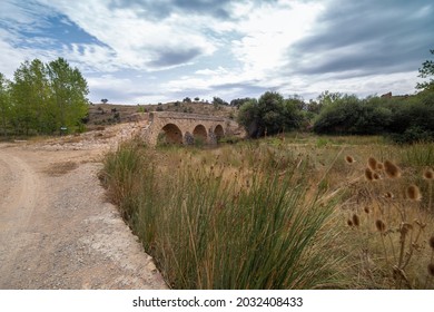 The medieval bridge in Pradas San Agustin village in Teruel Gudar mountain range Aragon Spain