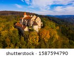 Medieval castle of Pernstein on a hill in the forest. South Moravian region. Czech Republic
