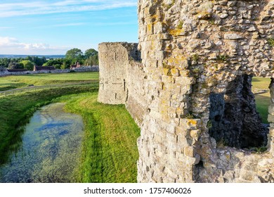 Medieval Castle Ruins From The 1066 Era, Closeup Of Castle Wall And Moat, Suitable Photo As A Medieval Background Or An English Travel Icon