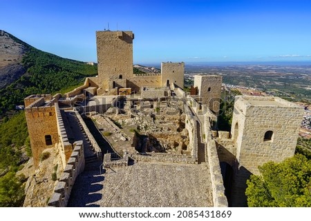 Medieval castle of Santa Catalina on top of the mountain in sunny day. Jaen Spain.