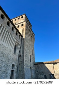 Medieval Castle Of Torrechiara In Parma Defensive Walls And Drawbridge. High Quality Photo