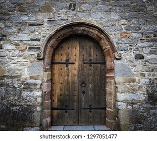 Medieval Castle Wooden Door, And Stone Wall Background