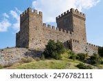 Medieval Consular Castle in the ancient Genoese fortress on a sunny May day. Sudak, Crimea