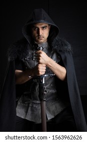 Medieval Or Fantasy Male Character In Leather Jerkin And Cloak With Weapons