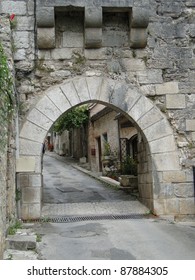 Medieval gate  in city walls of  Rocamadour, France