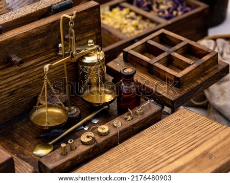 medieval historical reenactment - merchant's objects, small metal scales for weighing light goods such as spices or herbs