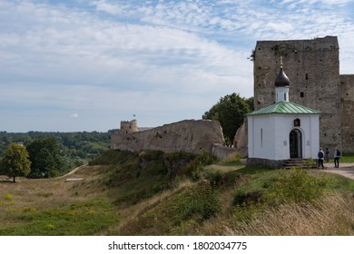 Medieval Izborsk fortress wall,  Talavskaya tower and Chapel of the Korsun Icon of the Mother of God. Izborsk, Pskov region, Russia.