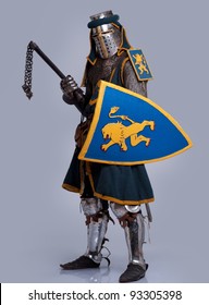 Medieval Knight Isolated On Grey Background.