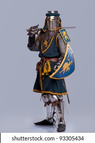 Medieval Knight Isolated On Grey Background.