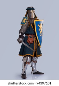 Medieval Knight Isolated On Grey Background.