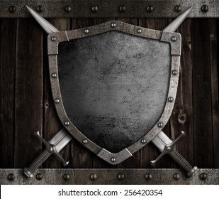 Medieval Knight Shield And Crossed Swords On Wooden Gate