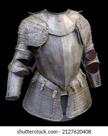Medieval knight suit of armor protection isolated on black background with clipping path. Ancient steel metal armour