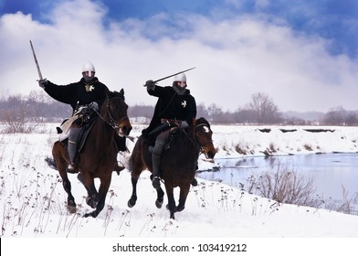 Medieval Knights Of St. John (Hospitallers) Riding On A Bay Horses