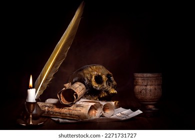 medieval occult still life with skull and candle - Shutterstock ID 2271731727