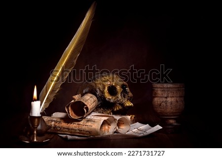 medieval occult still life with skull and candle