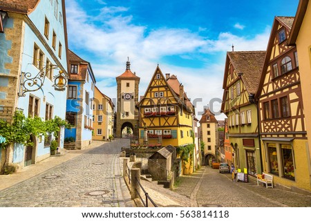  Medieval old street in Rothenburg ob der Tauber in a beautiful summer day, Germany 