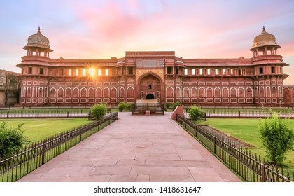 Medieval palace made of red sandstone and marble inside Agra Fort at sunrise. Agra Fort is a UNESCO World Heritage site at Agra India. 