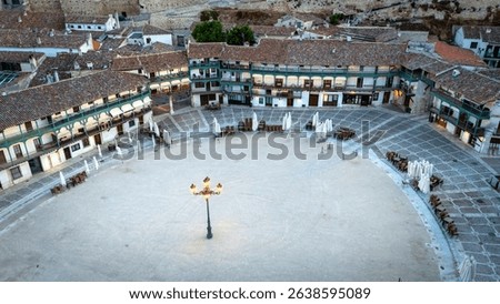 The medieval Plaza Mayor of the town of Chinchon, Madrid, with its typical painted wooden balconies from above