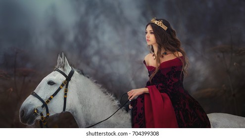 Medieval Queen On White Horse At Twilight Winter Forest 