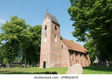 Medieval roman Saint-Margaretha church on the green in the village Norg in the province Drenthe