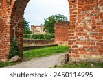 Medieval ruined gateway, entrance to the park of Dargun Manor and Monastery, Mecklenburg Lake District, Mecklenburg-Western Pomerania, Germany.