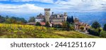 Medieval scenic villages and castles of Italy -Vigoleno with autumn vineyards in Emilia-Romagna region
