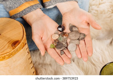 medieval slavic woman holding pile of old coins. image on white background. historical concept. - Shutterstock ID 389753923