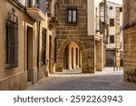 Medieval stone buildings and arches with stone columns in the Unesco city of Ubeda, Jaen.