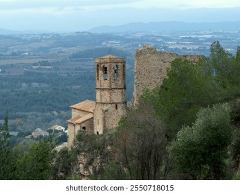 Medieval stone church tower with bells. - Powered by Shutterstock