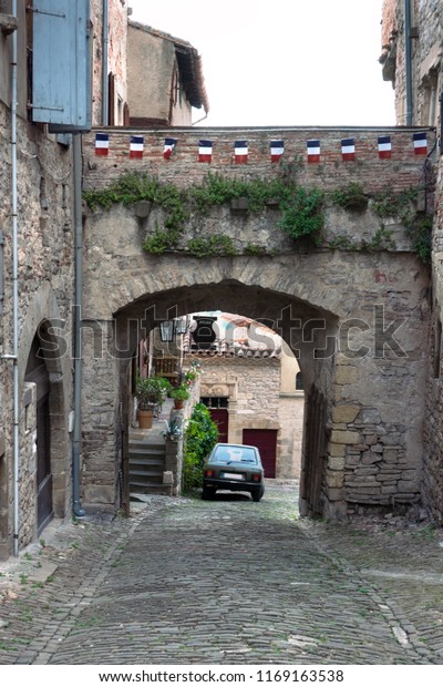Medieval street in\
Cordes Sur Ciel\
village