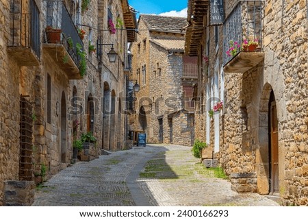 Medieval street in Spanish village Ainsa.