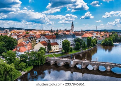 Medieval Town Pisek and historic stone bridge over river Otava in the Southern Bohemia, Czech Republic. Pisek Stone Bridge, the oldest preserved early Gothic bridge in the Czech republic. - Powered by Shutterstock