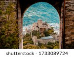 Medieval Valere basilica seen through main gates of Tourbillon Castle located in Sion city, canton Valais, Switzerland