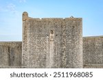 Medieval walls of the Old Walled City of Dubrovnik, UNESCO world heritage site at the Adriatic Sea in Republic of Croatia