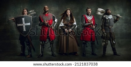 Medieval warriors. Creative art collage with brutal serious multiethnic knights in war clothes with wounded faces holding shield, sword isolated over vintage background. Comparison of eras, history