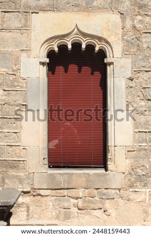 Medieval window in the Gothic Quarter of Barcelona, Spain