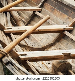 Medieval wooden ship on oars. Reconstruction of the events of the Middle Ages in Europe. - Shutterstock ID 2220302503