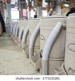 Medina, Saudi Arabia/ February 18th 2020: Row Of Zamzam Water Or Holy Water Drums. Translation Text