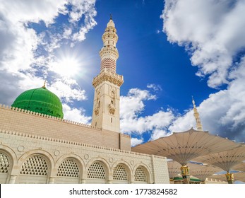 Medina, Saudi Arabia - July 07, 2020: View of cloudy blue sky at Nabawi Mosque or Prophet Mosque in Medina, Saudi Arabia. Selective focus