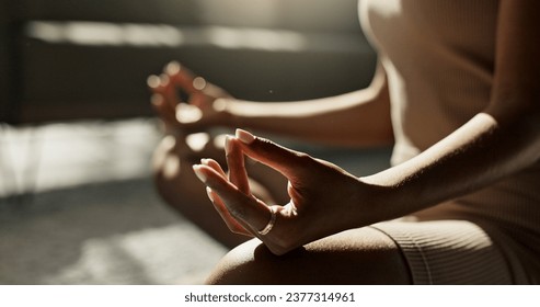 Meditation, hands woman in lotus pose on a floor for peace, zen or mental health wellness at home. Breathing, relax and female person in living room for energy training, exercise or holistic practice - Powered by Shutterstock